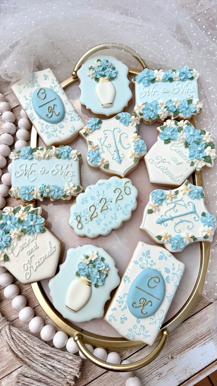 Pale blue floral wedding cookies with gold details