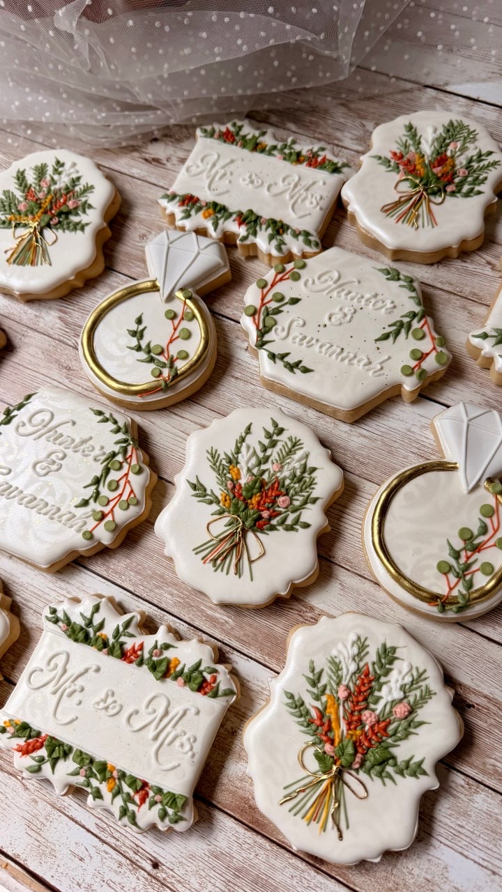White floral wedding cookies with hand-piped bouquets