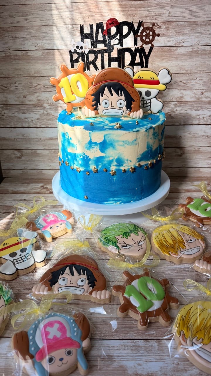 Pirate anime birthday cake with matching character cookies